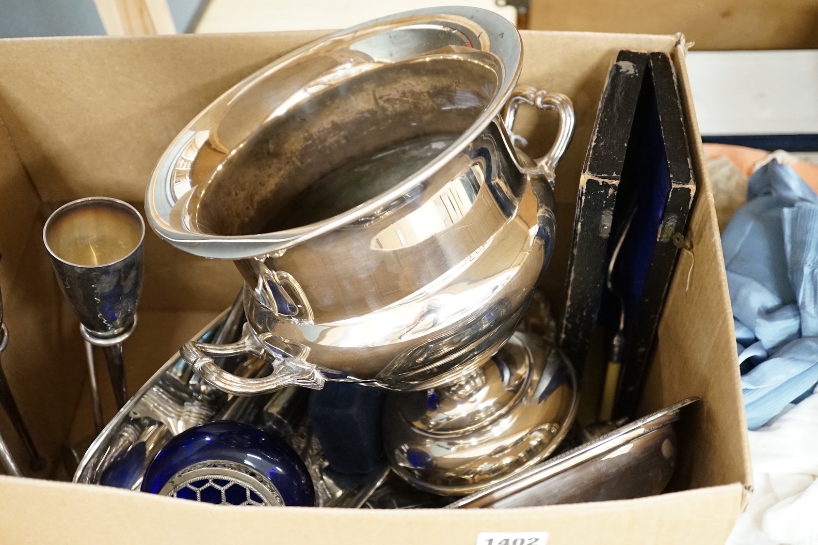 Assorted plated ware including wine cooler.